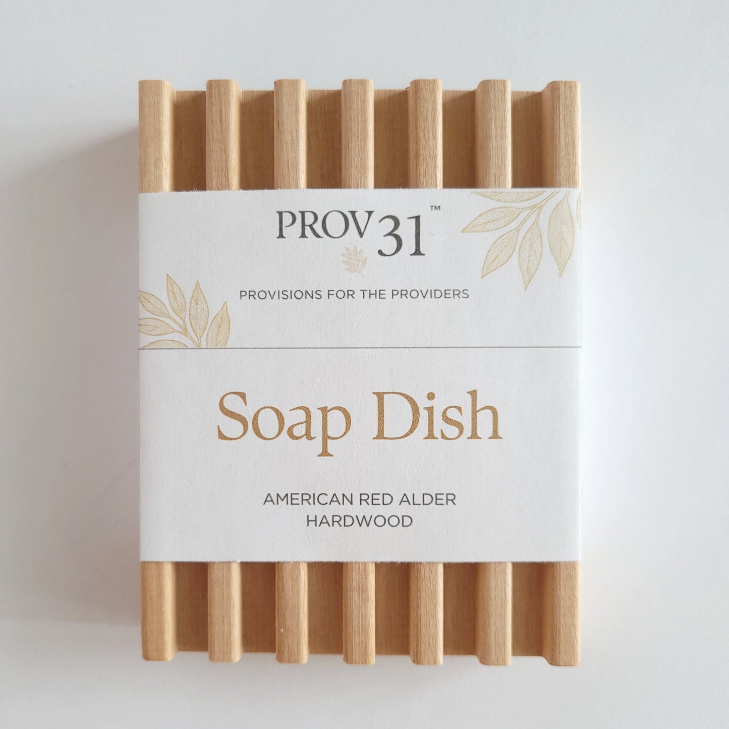 Wooden soap dish with a PROV31 label on a white background