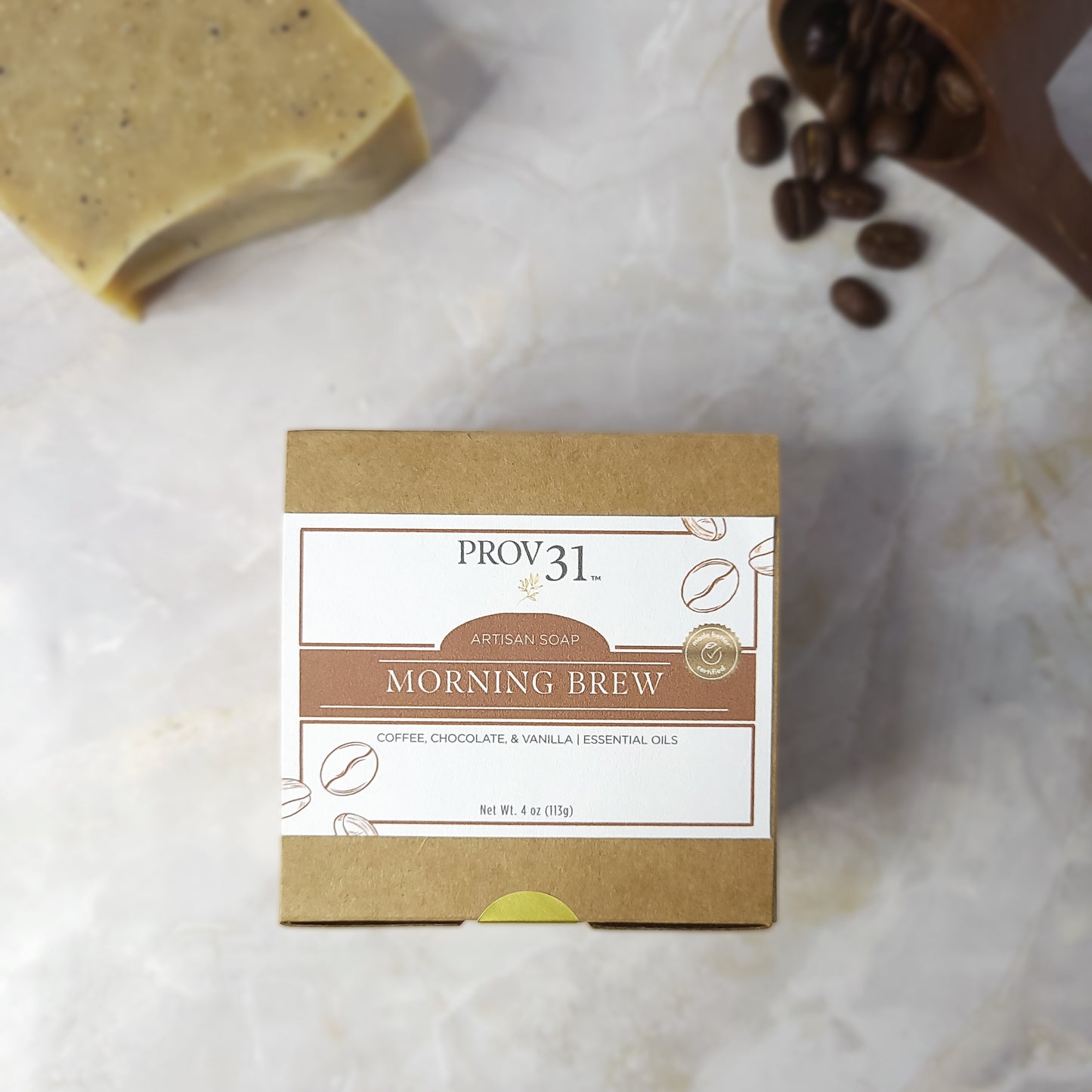 PROV 31 artisan soap packaging labeled 'Morning Brew' on a marble surface with coffee beans and soap.