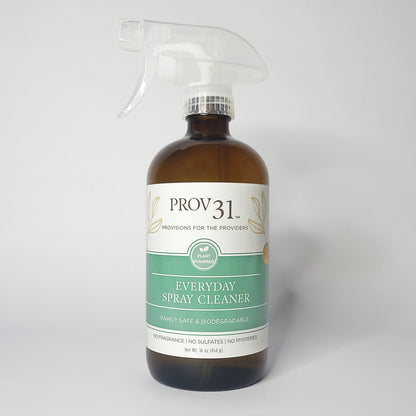 Prov 31 everyday spray cleaner in a glass bottle with a label that reads plant powered, on a white background