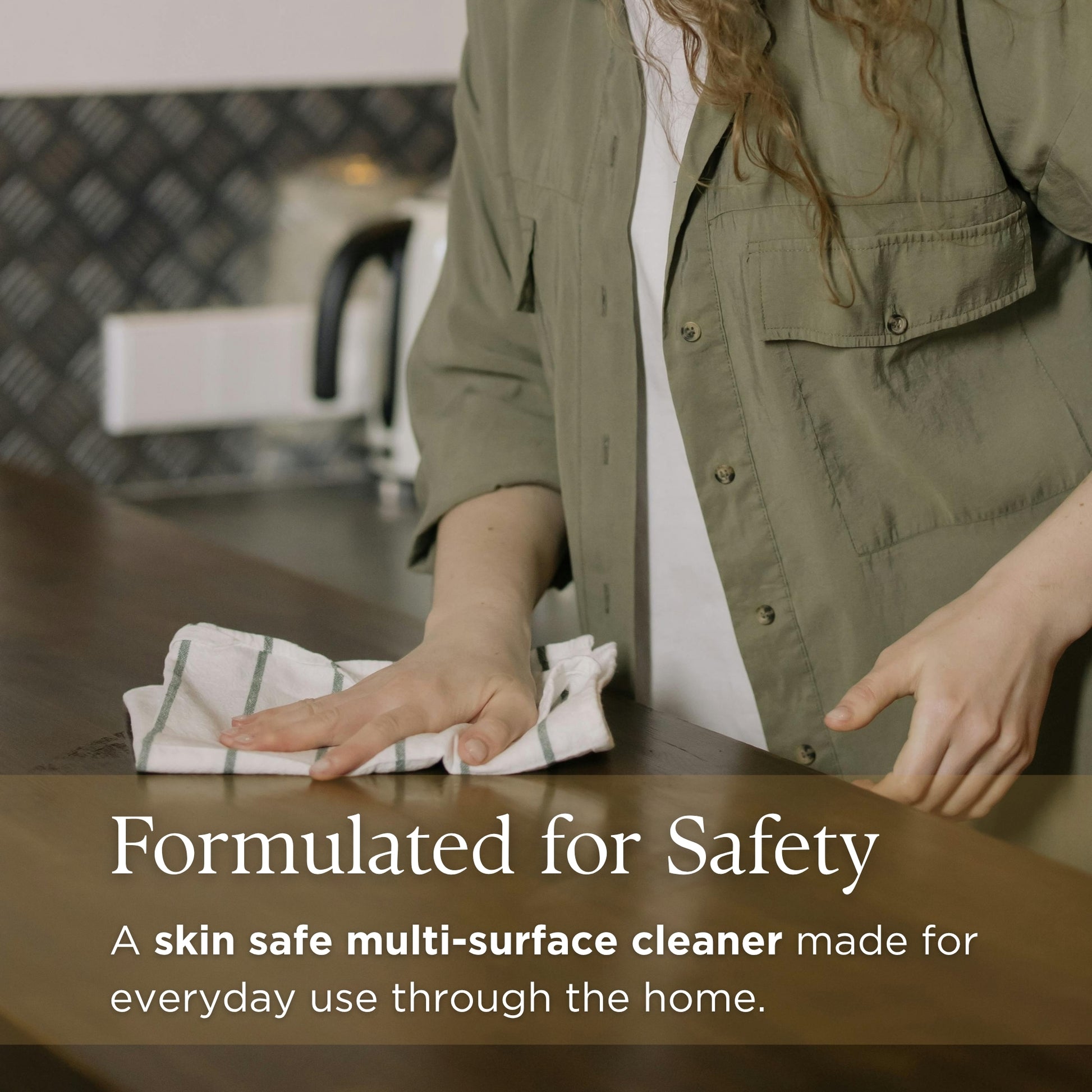 Person cleaning a surface with text about Prov 31's skin-safe multi-surface cleaner