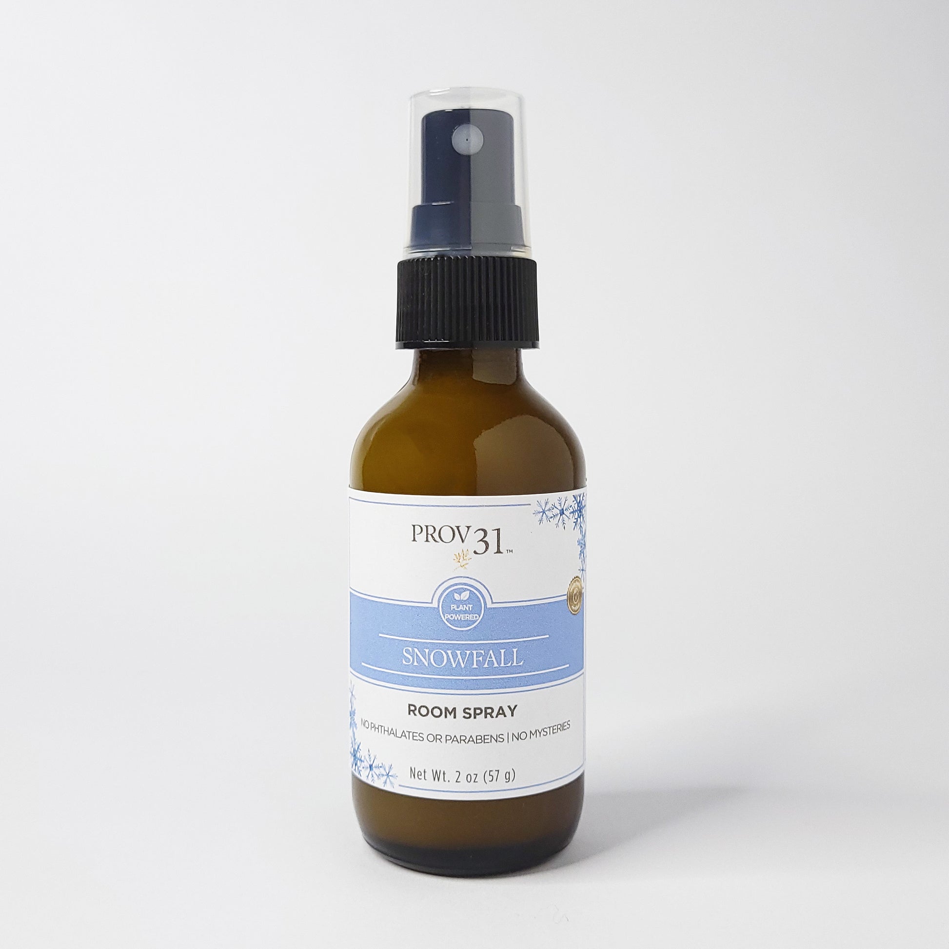 Glass spray bottle labeled 'PROV 31 Home Snowfall Room Spray' on a white background