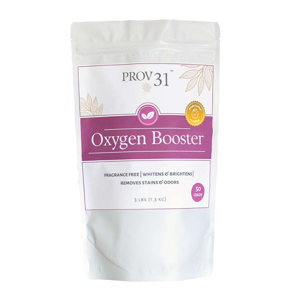 A white stand-up pouch of Prov 31 Oxygen Booster with a magenta and white label, photographed against a plain white background.
